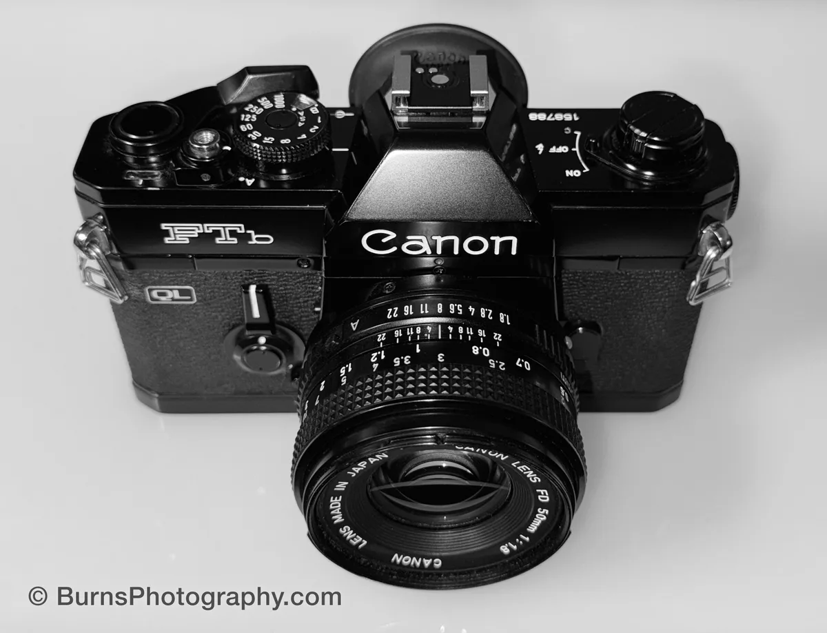 Black Canon FTb QL 35mm film camera with 50mm f/1.8 FD lens