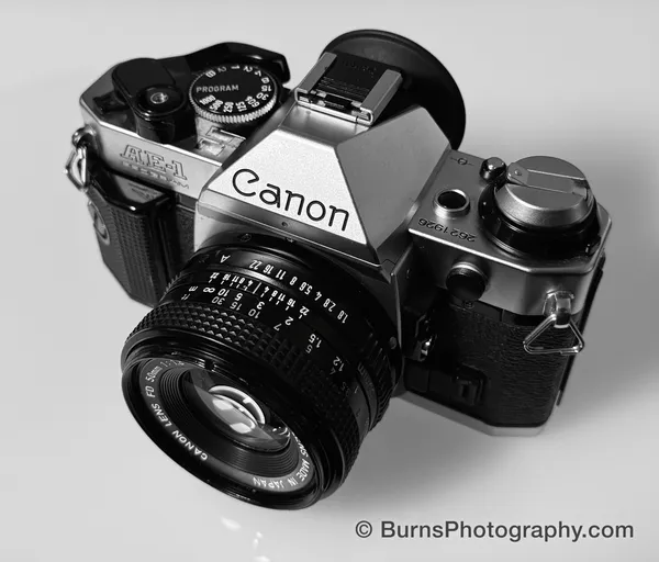 A Canon AE-1 Program film camera with 50mm FD lens